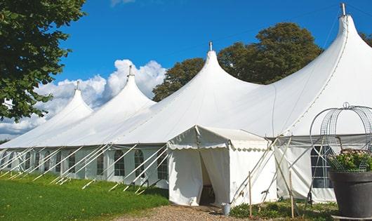 high-quality portable restrooms stationed at a wedding, meeting the needs of guests throughout the outdoor reception in Plainville